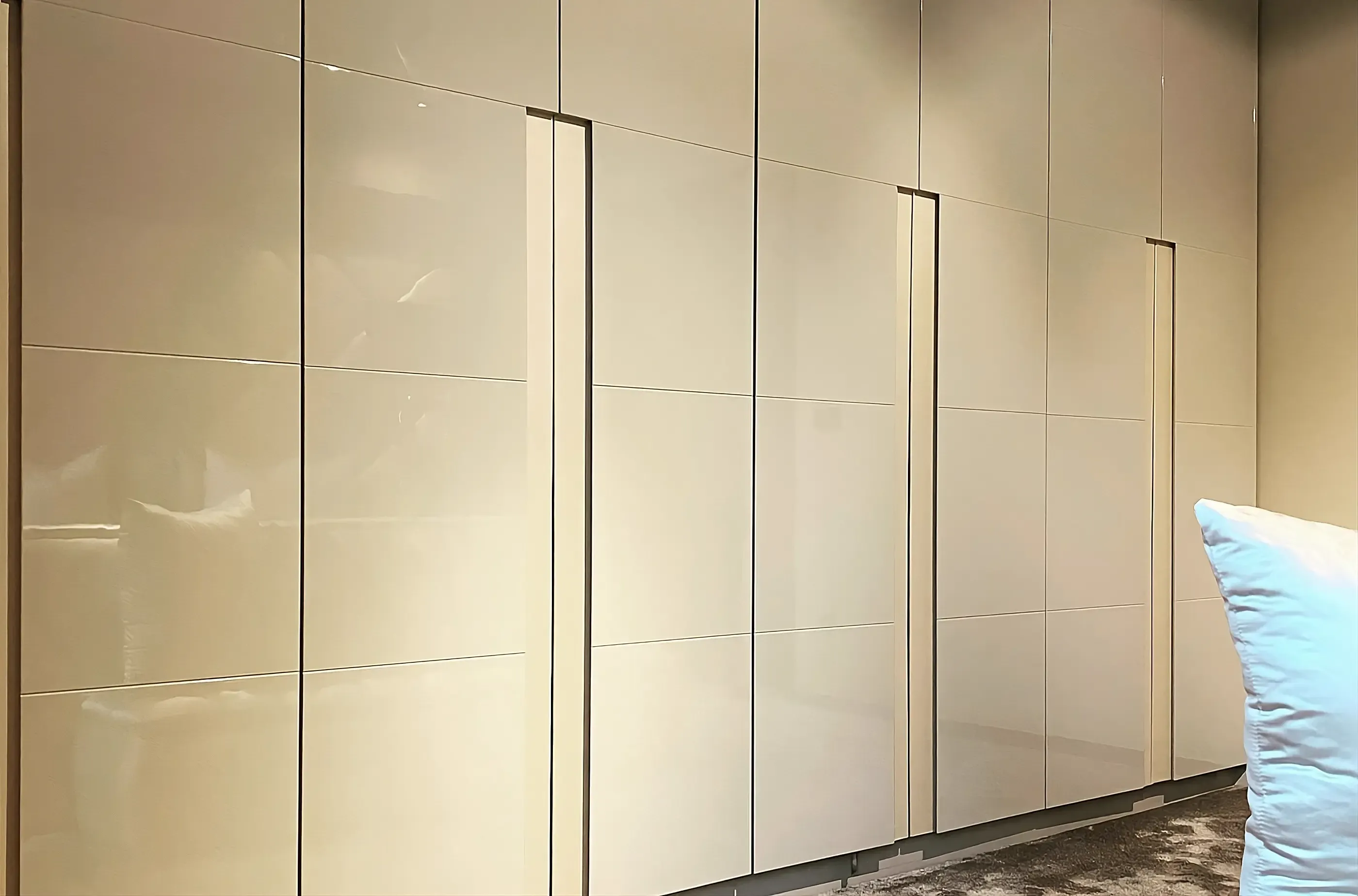 Bathroom with natural stone and brass fixtures suited to coastal conditions